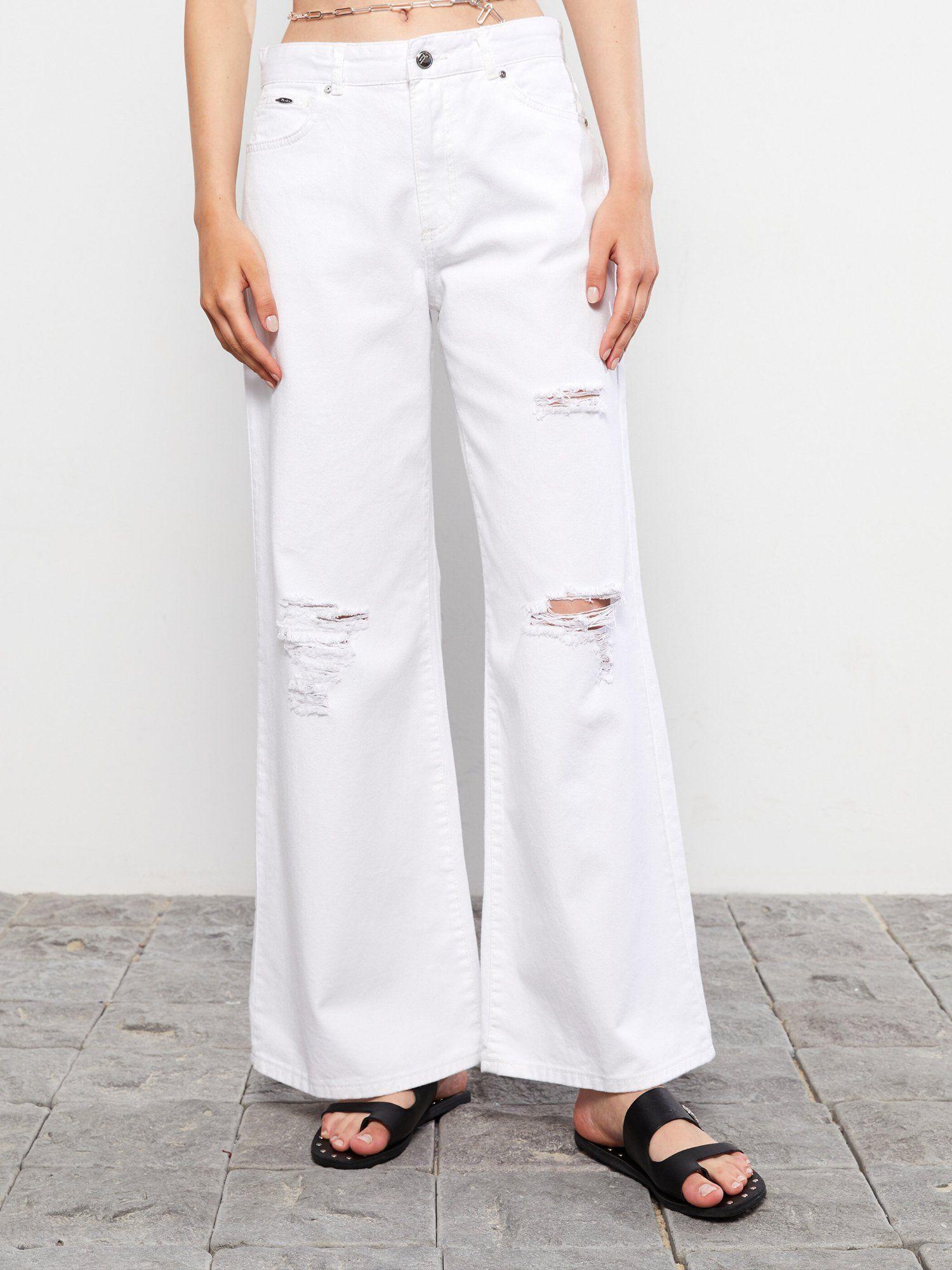 white rodeo flared denims