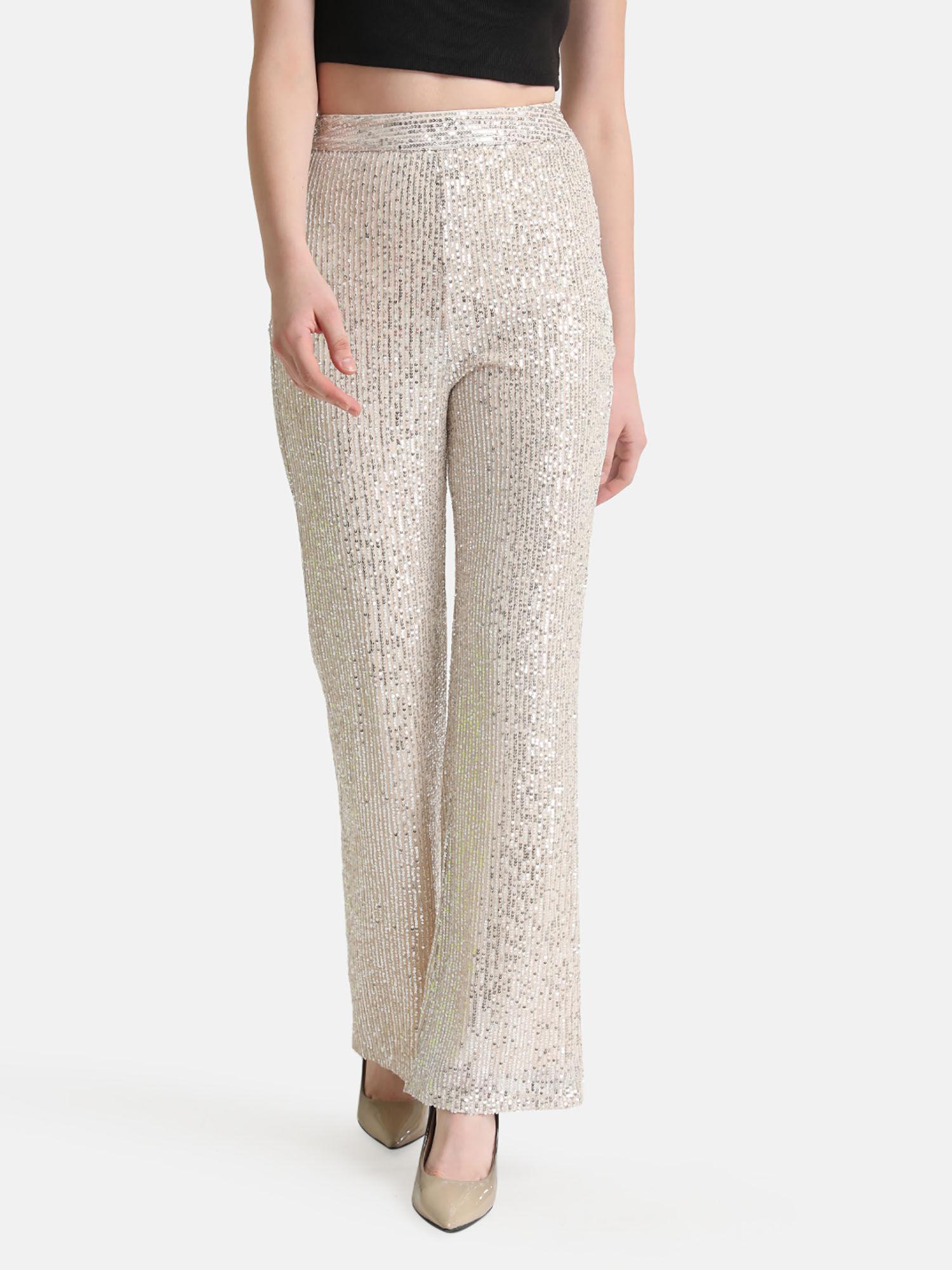 white sequin flared trousers