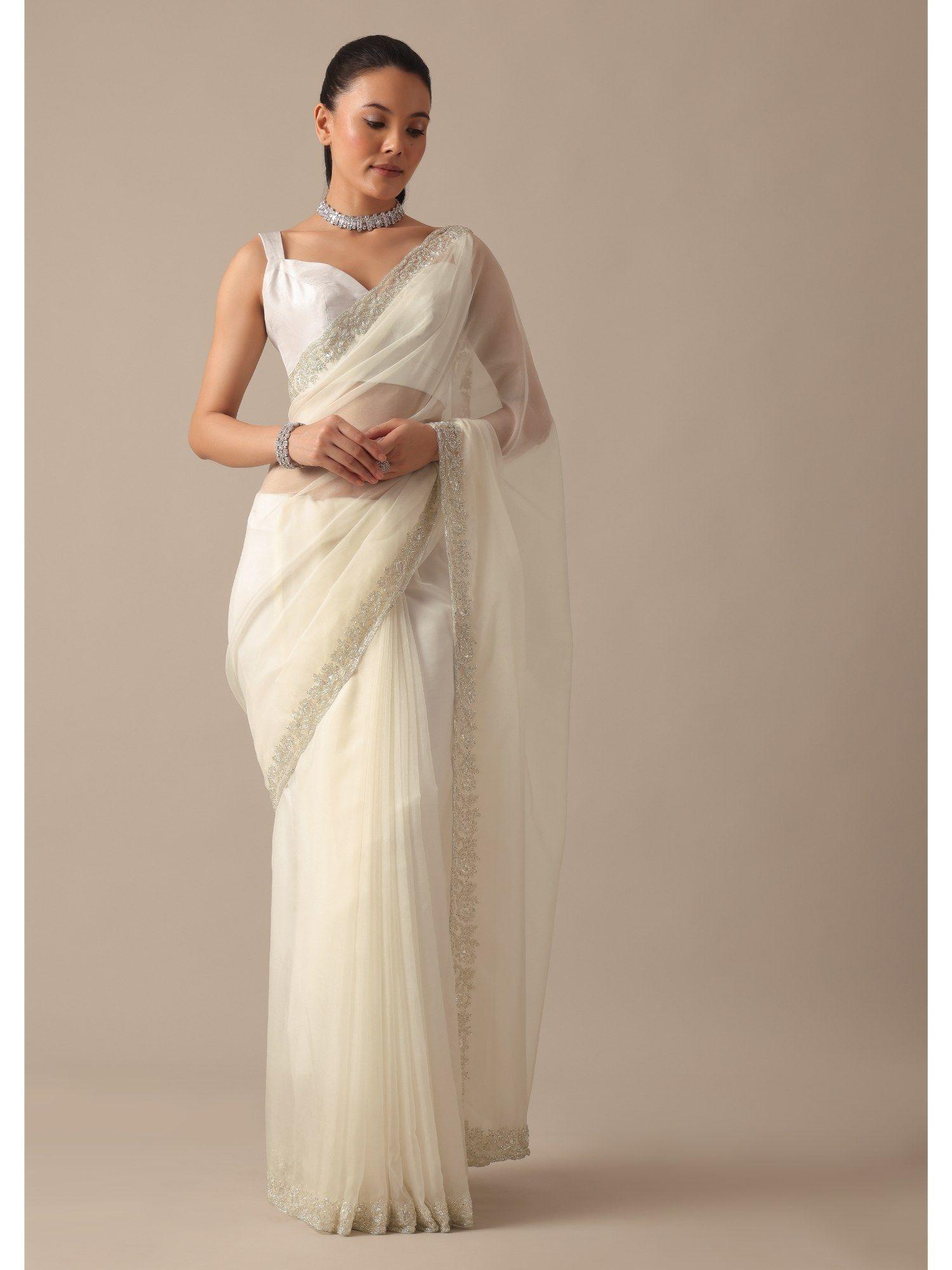 white sheer organza saree with scallop cutwork with unstitched blouse