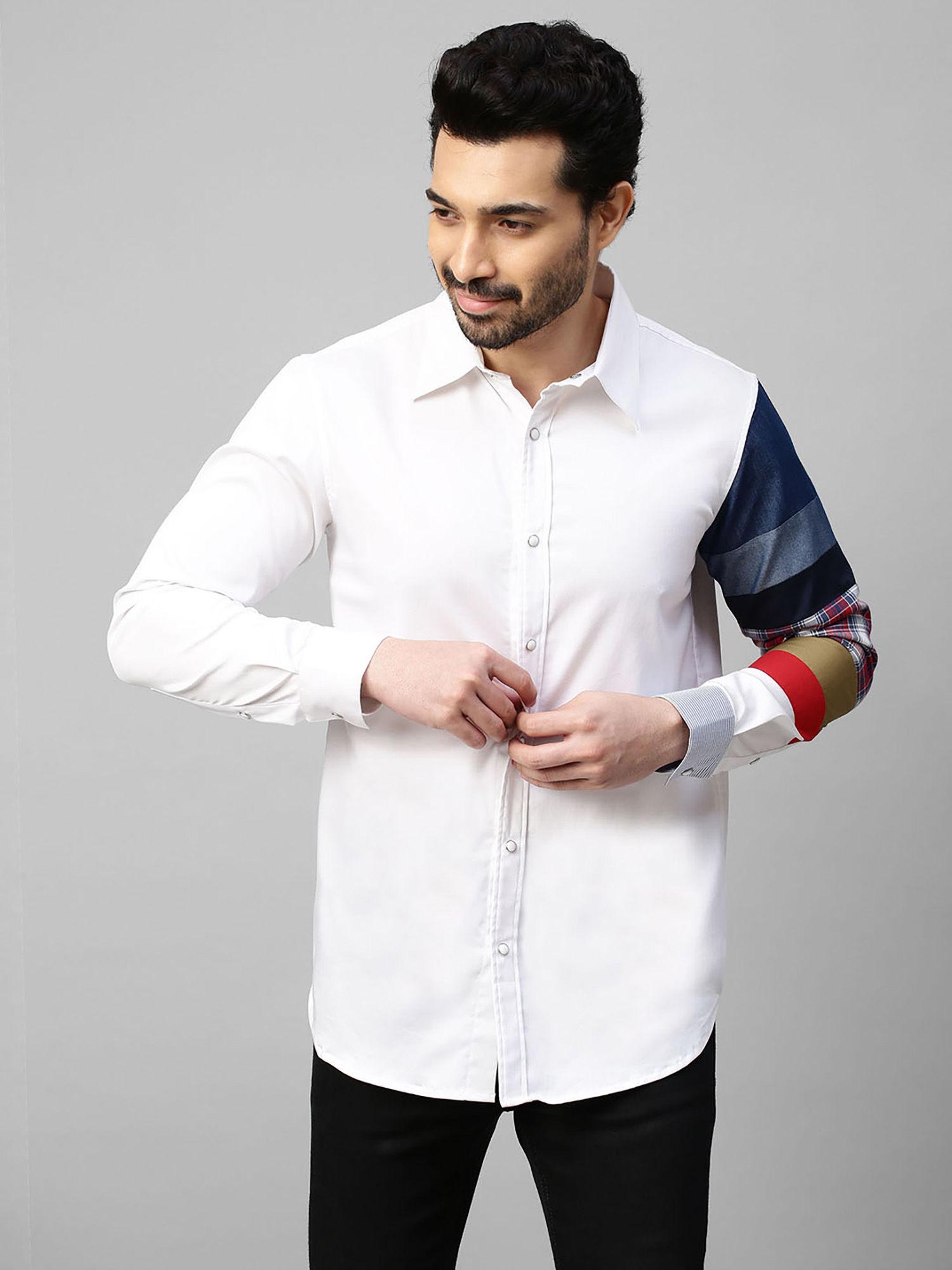 white shirt with multicolor patchwork on one sleeve