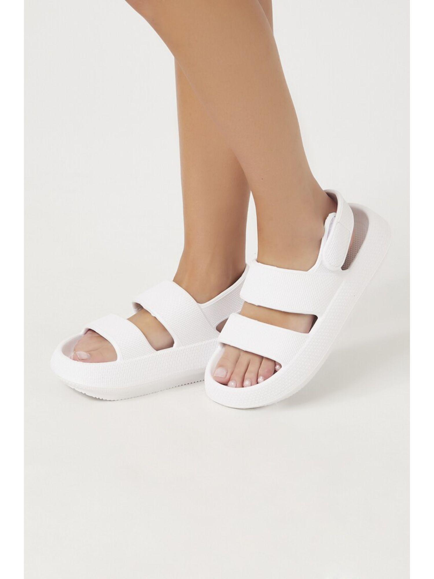 white solid flat sandals