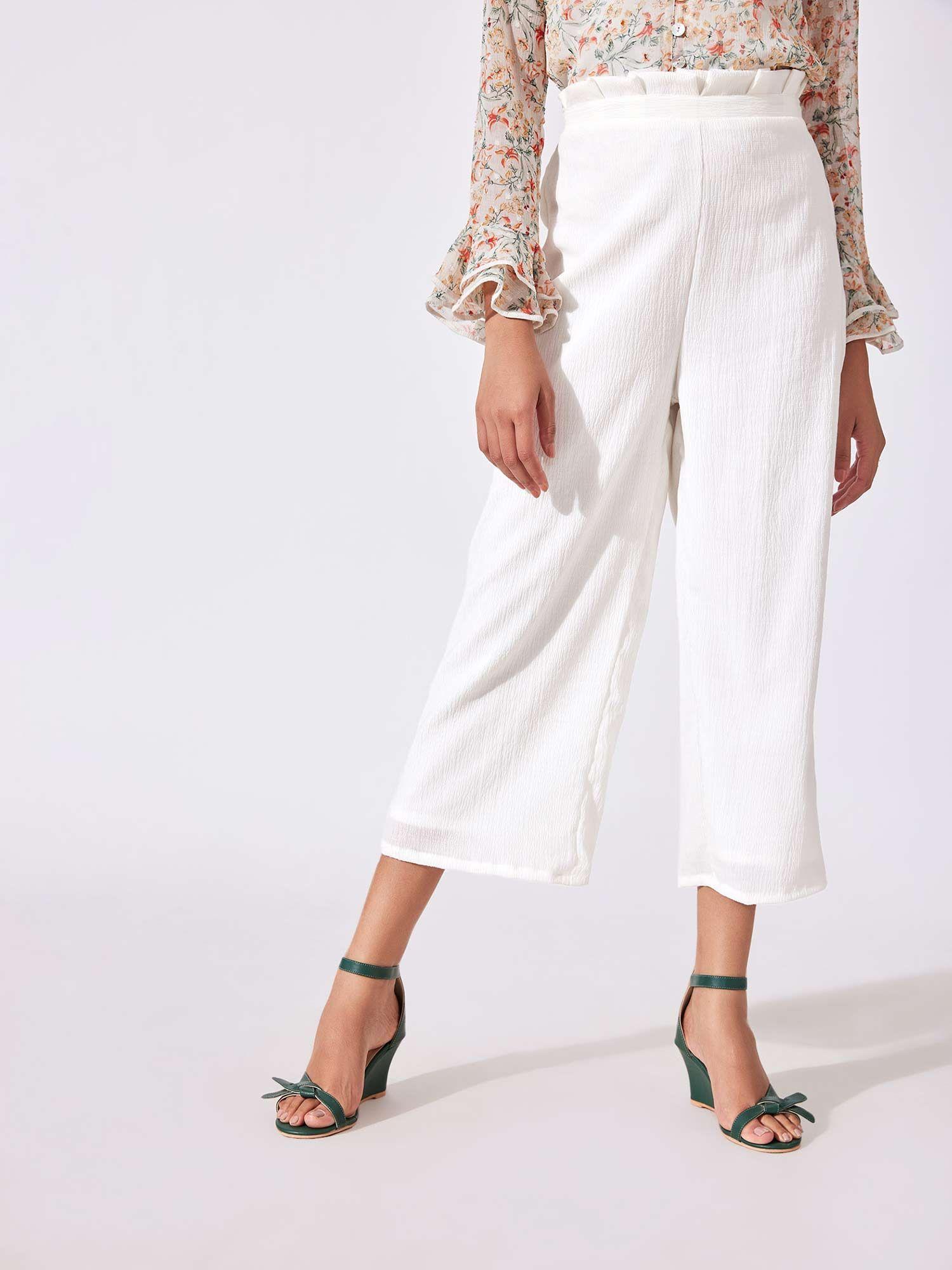 white textured flare pants