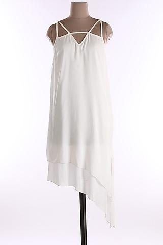 white tunic with cross straps