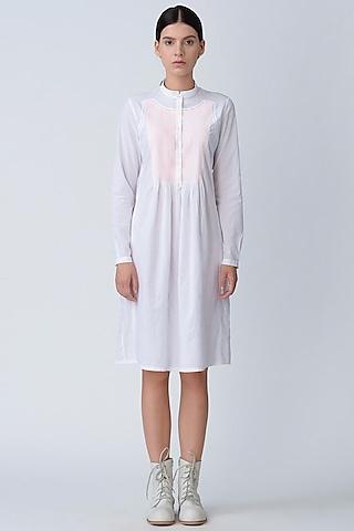 white tunic with fluorescent detailing