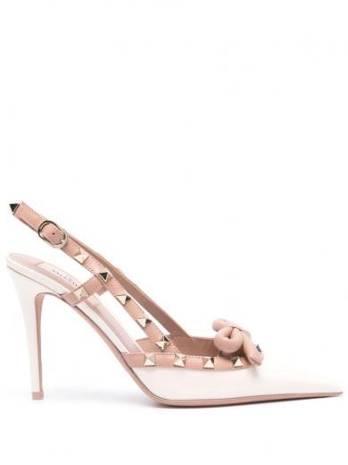 white white rockstud bow patent leather pumps