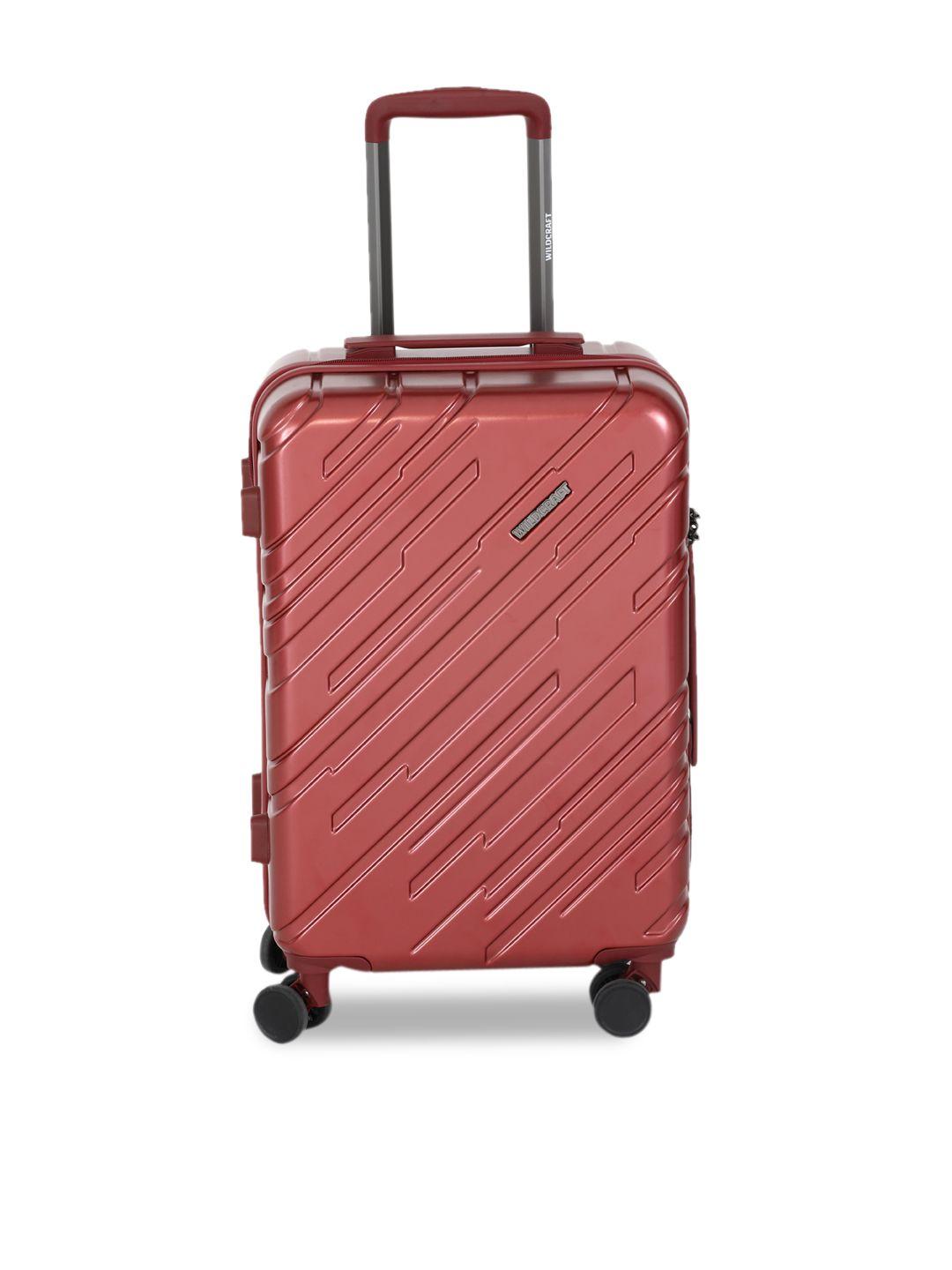 wildcraft red textured hard-sided large trolley suitcase