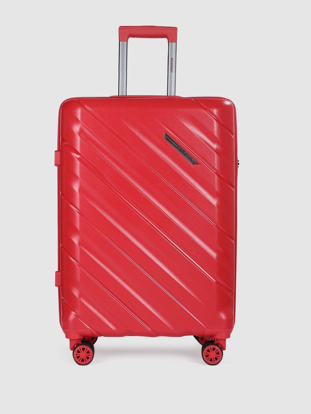 wildcraft unisex columbus red large  textured hard sided canopus cabin trolley suitcase