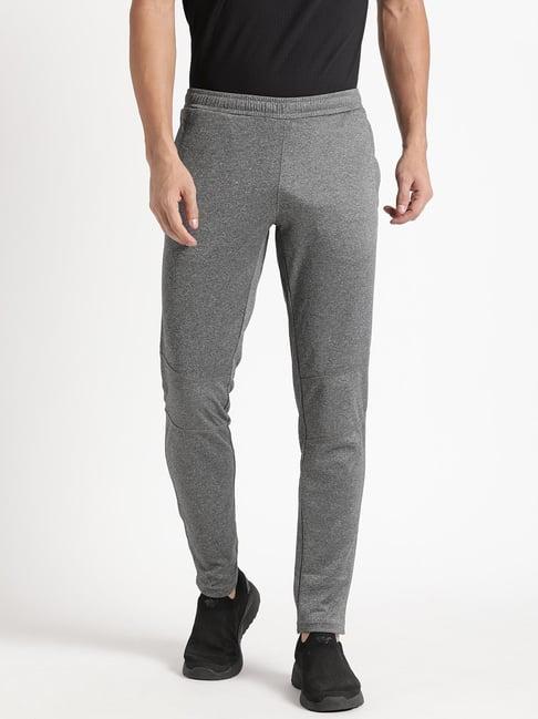 wildcraft black regular fit self pattern trackpants