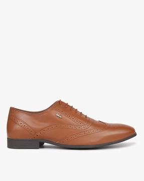 wing-tip brogue shoes with metal logo