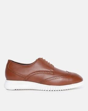 wing-tip lace-up brogues