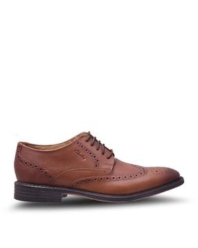 wingtip derby shoes with broguing