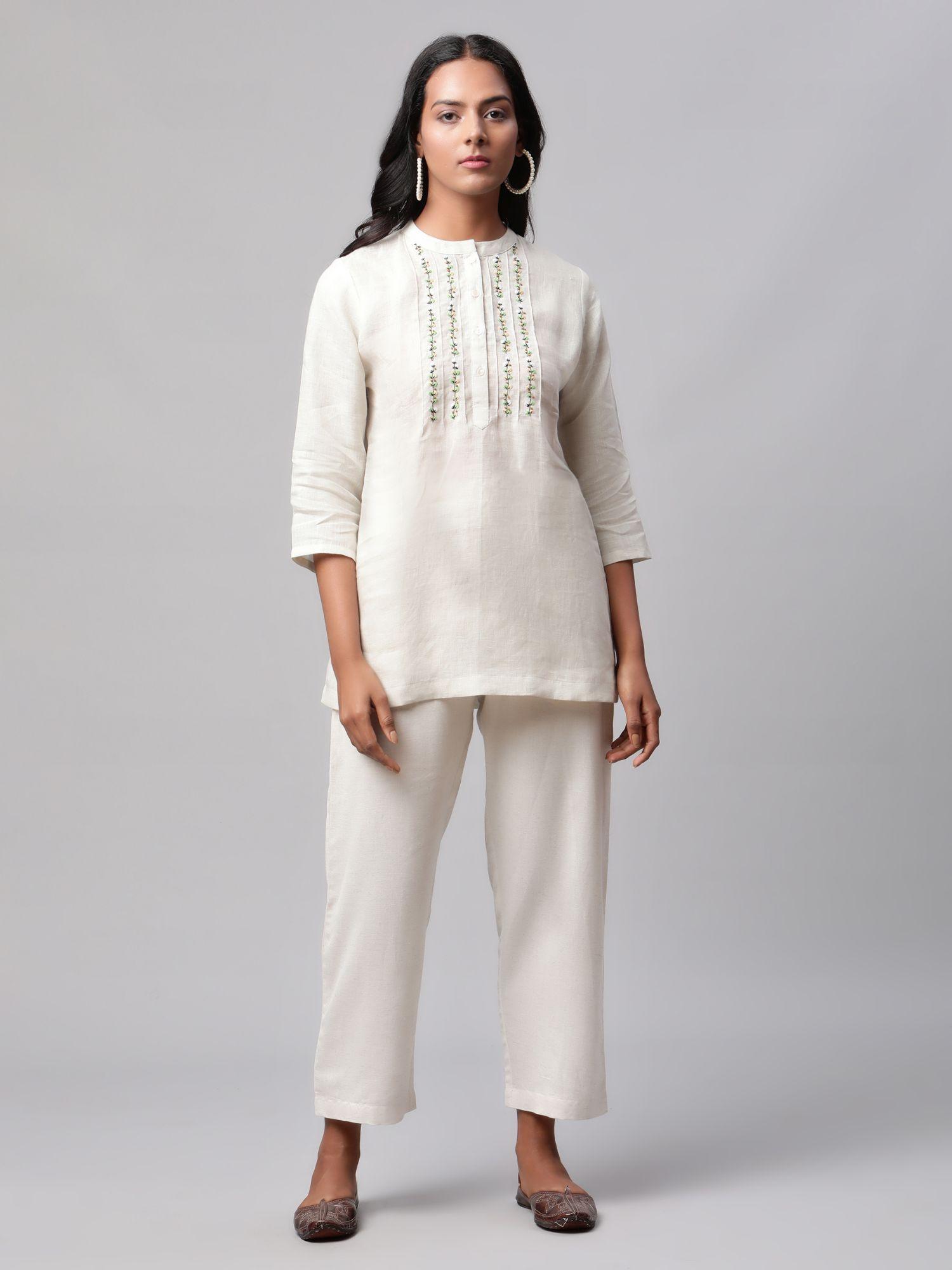 woman green embroidered tunic