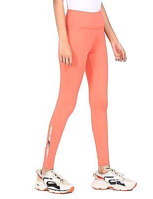 women coral mid rise solid leggings