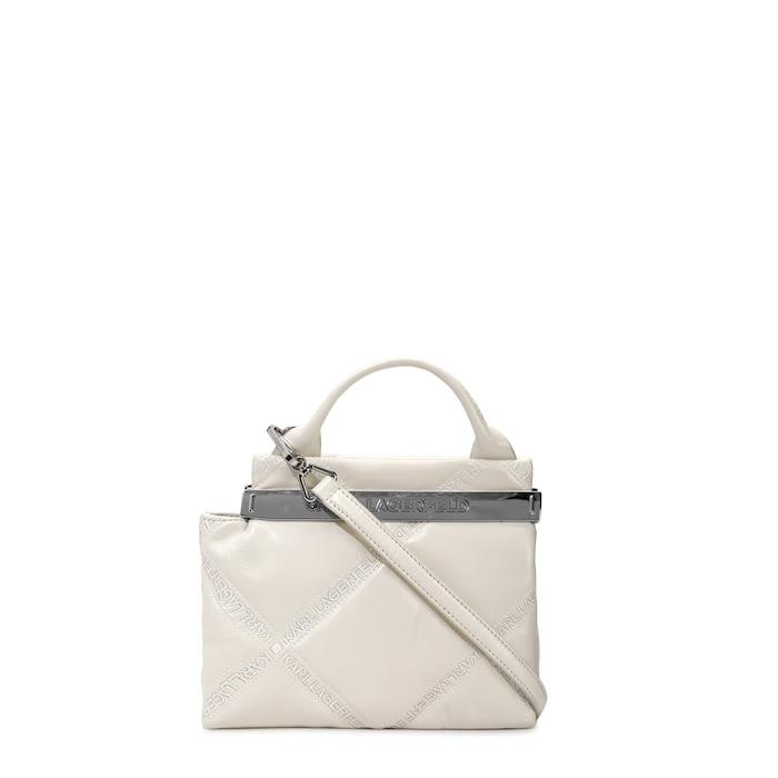 women cream debossed embroidered quilted leather bag