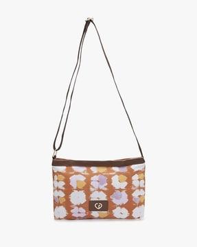 women dyed sling bag with applique logo