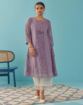 women-embroidered-straight-tunic-with-tassels