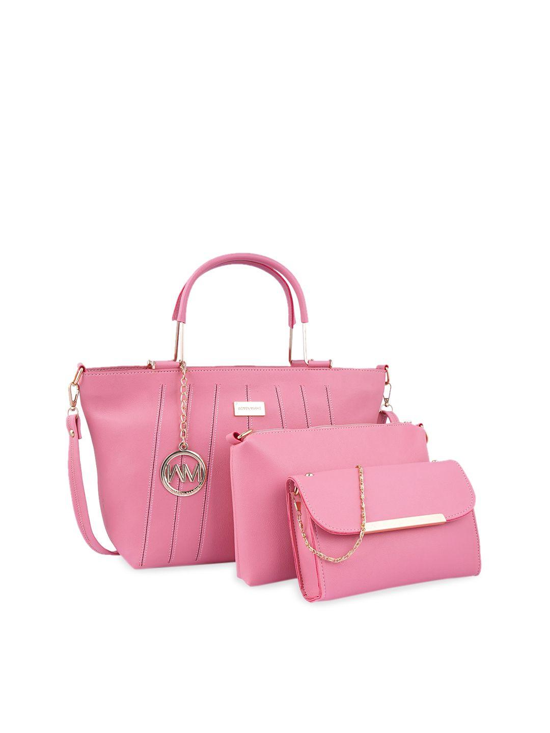 women marks pink solid handheld bag combo