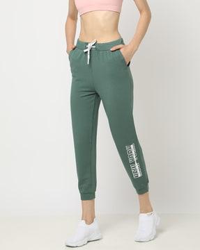 women mid-rise joggers with placement print