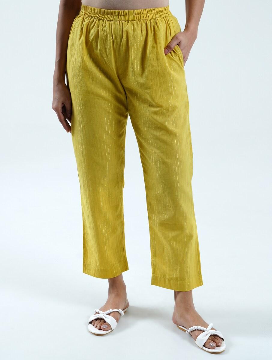 women mustard yellow cotton blend solid regular regular fit pants