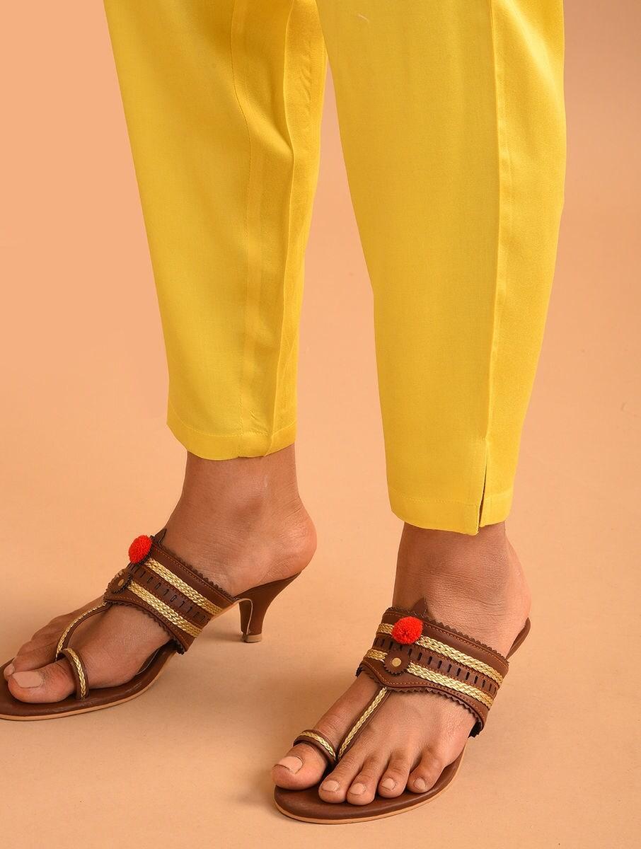 women mustard yellow modal solid ankle length regular fit pants