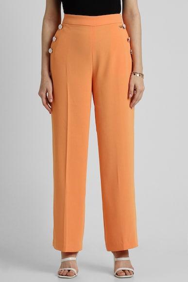 women orange regular fit solid formal trousers