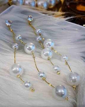 women pearl-beaded danglers