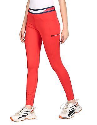 women red mid rise elasticized waist solid active leggings