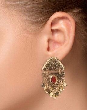 women stone-studded danglers earrings