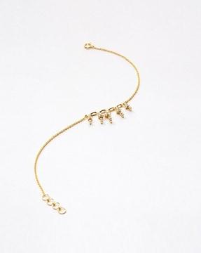 women yellow gold dangling heart diamond bracelet