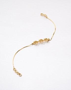 women yellow gold feather array diamond bracelet