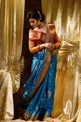 women's light blue banarasi satin silk saree with stone work with blouse piece - blue