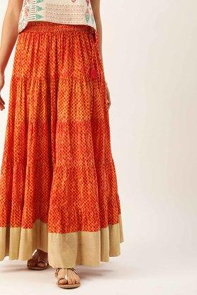 women's rust and mustard printed flared long skirt with gotta detailing at hemline - rust