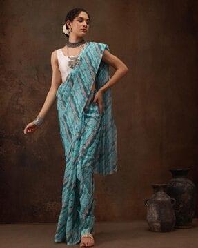 women abstract print saree