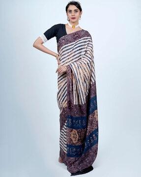 women ajrak print cotton saree with tassels