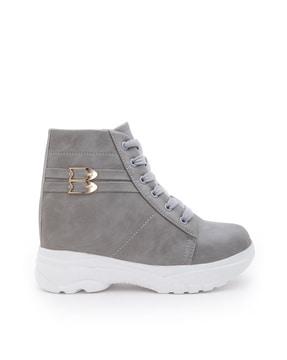 women ankle-length boots with metallic accent