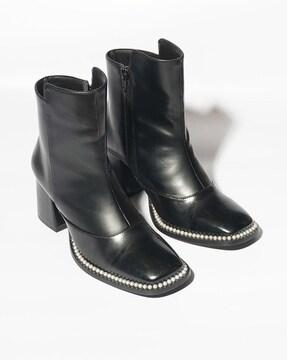 women ankle-length boots with stitched detail