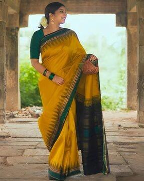women art silk saree with woven border