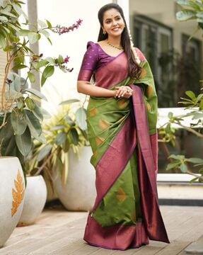 women banarasi saree with floral woven motifs