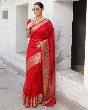 women banarasi saree with paisley woven motifs & contrast border