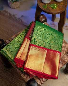 women banarasi saree with woven motifs