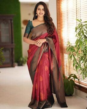 women banarasi silk saree with floral woven motifs