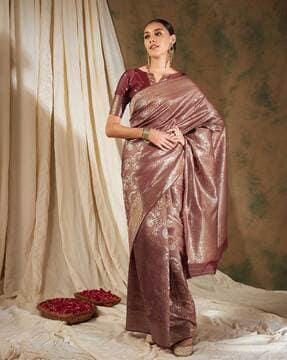 women banarasi silk saree with floral woven motifs