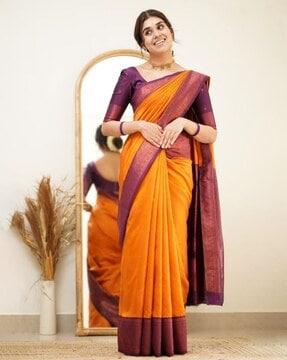 women banarasi silk saree with woven motifs