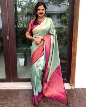 women banarasi woven saree with zari accent