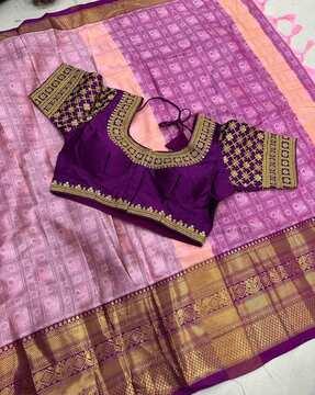 women banarasi woven saree with zari accent