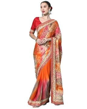 women bandhani print dora silk saree with heavy border