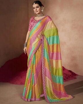 women bandhani print saree with contrast border