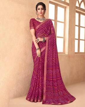 women bandhani print saree with contrast border