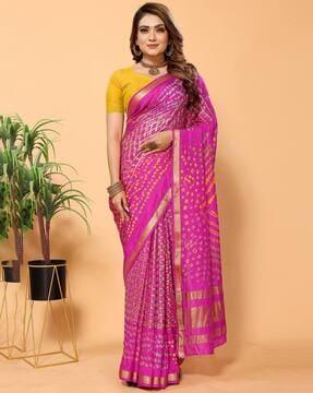 women bandhani print saree with contrast border