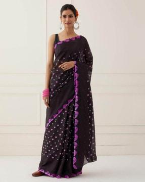 women bandhani print saree with contrast border